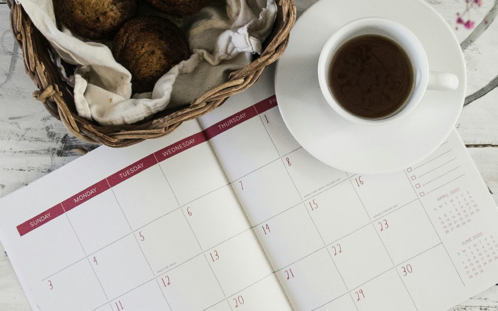 open journal with coffee